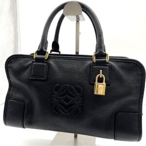 Loewe black leather purse reminds Hermes Kelly cut palladium